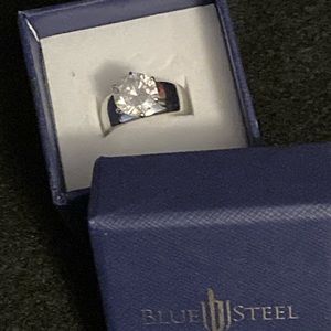 Sterling silver ring with white sapphire